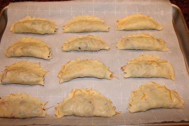 Place empanadas on baking sheet