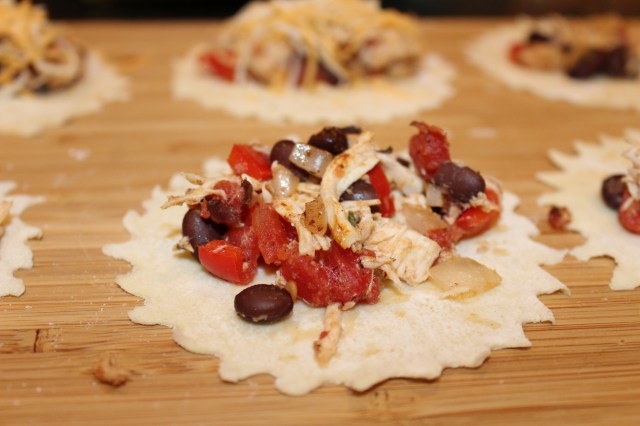 Place filling on empanada