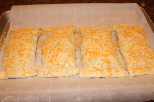 Sprinkle puff pastries with cheese