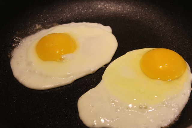 eggs cooking in pan