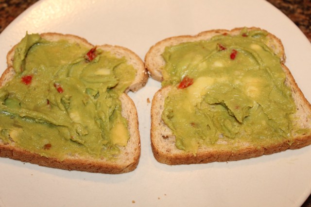 spread toast with guacamole