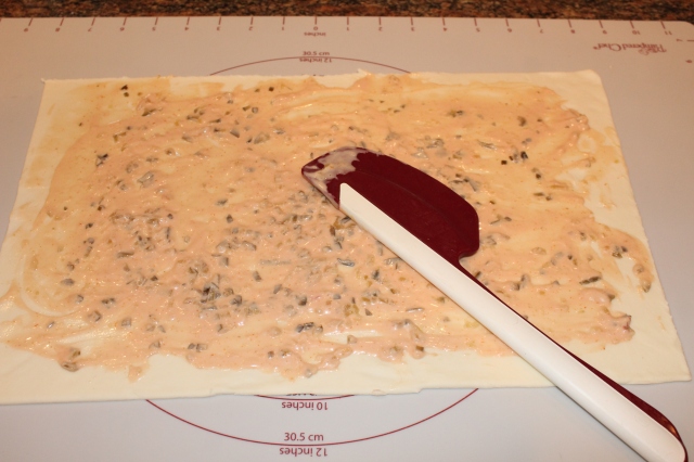 Spread 1000 island dressing over pastry