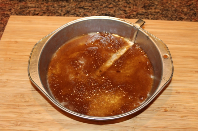 Sprinkle brown sugar over melted butter