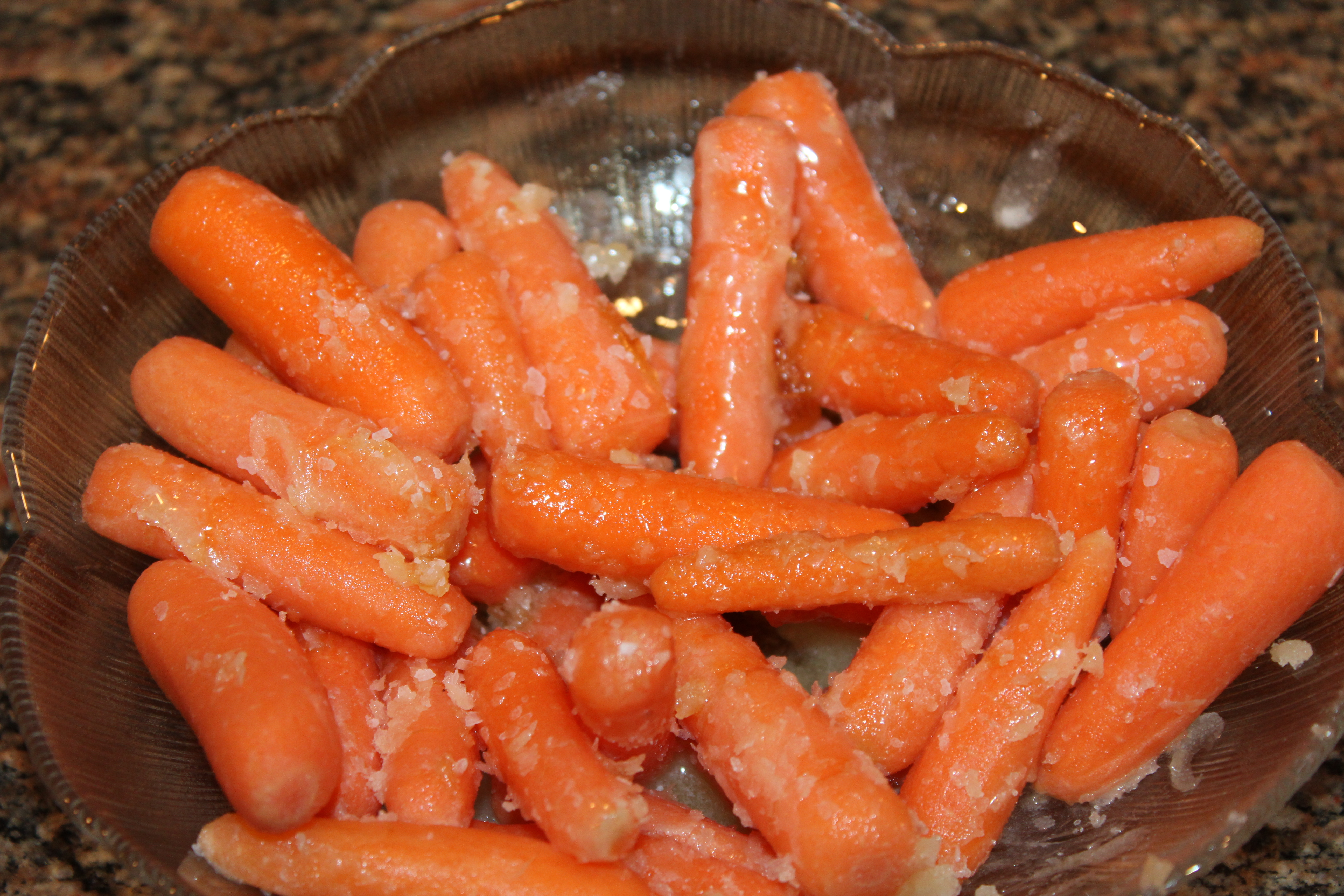 Toss carrots with honey, butter and salt